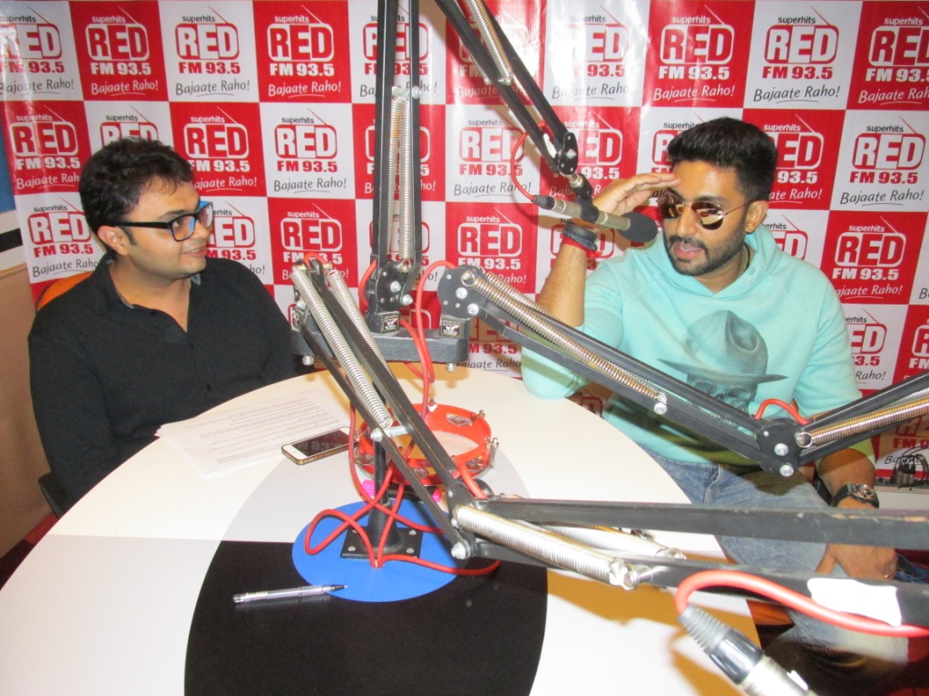 'All is well' actor Abhishek Bachchan with RJ Rishi Kapoor at 93.5 RED FM studio