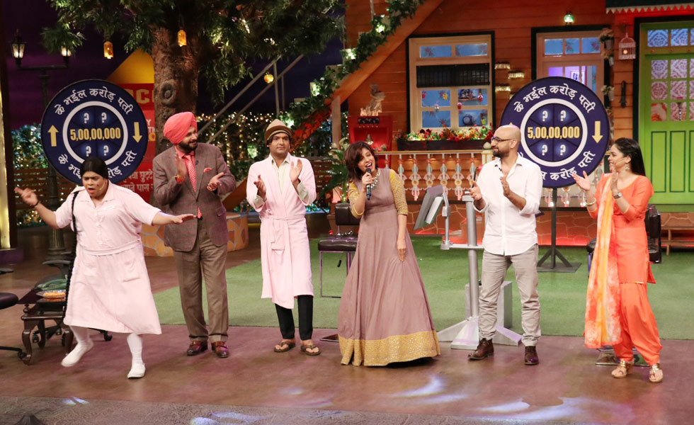 kapil with Sunidhi's father on the kapil sharma show