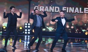  Anil Kapoor dancing along with Rising Star hostsMeiyang Chang and Raghav Juyal